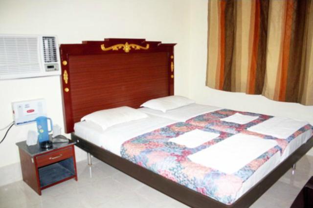 Hotel Maa Kamakhya Puri Rom bilde